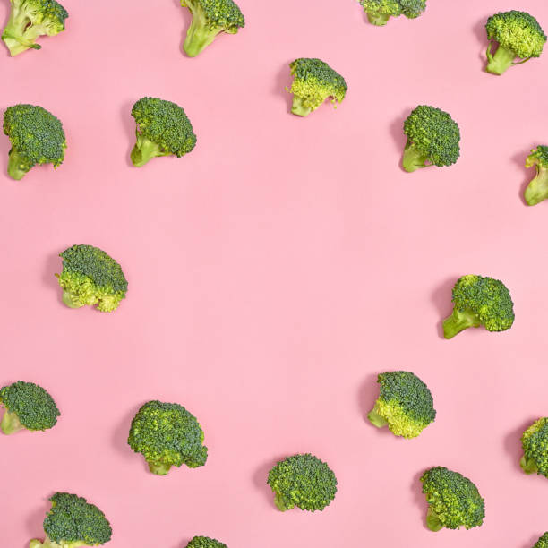 istock Broccoli creative copy space on pastel pink background. Healthy food vegetables concept. Flat lay 1415245553