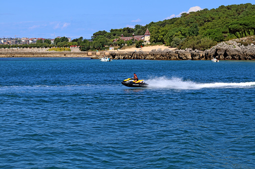 Practicing with a jet ski in the bay of Santander, Cantabria, Spain