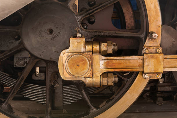 istock driving wheel with coupling rods of old locomotive 1415249936