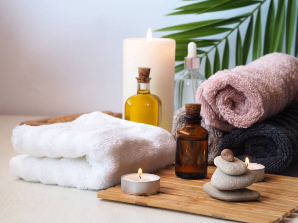 istock Massage oils, towels, candles. SPA 1415250013