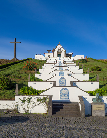 Portugal, VILA FRANCA DO CAMPO, Sao Miguel, Azores, December 20, 2018: The Marian sanctuary of Nossa Senhora da Paz, Our Lady Of Peace Chapel, beautiful small chapel with huge stairs on a high hill above the village of Vila Franca do Campo in Sao Miguel island Azores, Portugal.