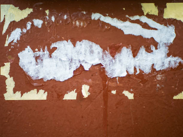 istock Abstract texture background. Metal wall with old torn street posters. Design element 1415250603