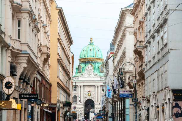 Kohlmarkt street and  Hofburg palace in Vienna stock photo