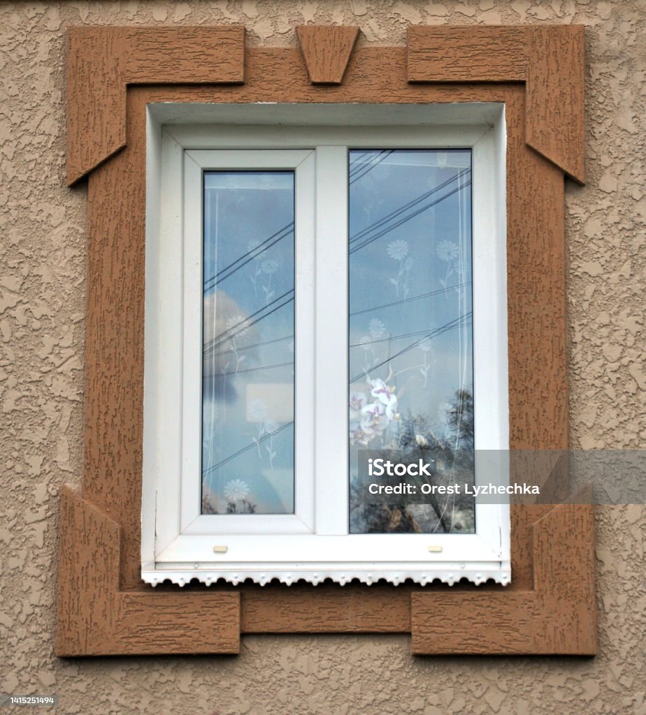 View from the street on the metal-plastic windows View from the street on the windows of metal-plastic Architecture Stock Photo