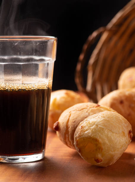istock Cheese bread, beautiful cheese breads on rustic wood and a cup of hot coffee. selective focus. 1415252590