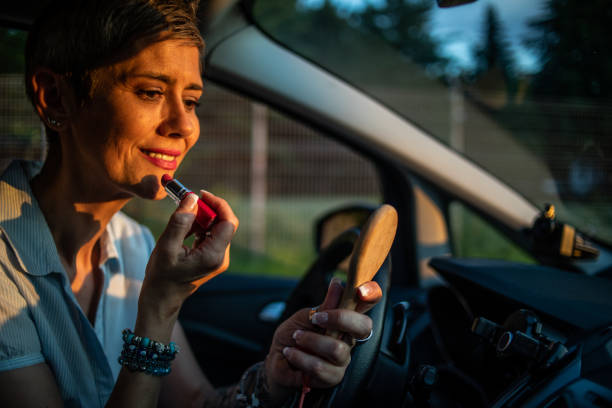 istock I do my makeup while driving because I'm always in a rush 1415254903