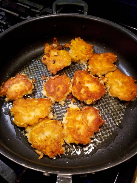 Potato Latkes Cooking in Frying Pan
