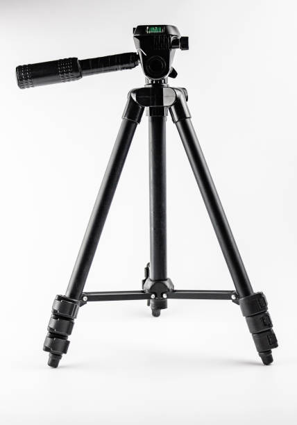 istock Tripod for a camera, camcorder on a white background. Camera tripod. 1415258536