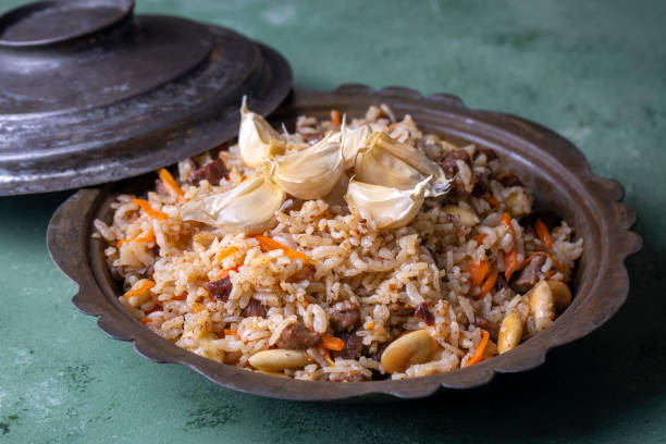 istock Traditional delicacies, Uzbek pilaf (Turkish name; Ozbek pilavi) 1415259724