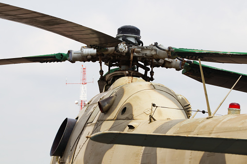 Novosibirsk, Siberia, Russia - September 25, 2022.\nAn airfield with helicopters and an airplane in the parking lot.