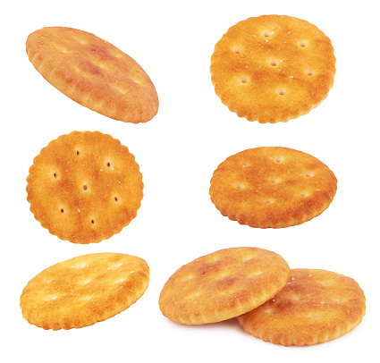 Round salted snack cracker isolated on white background