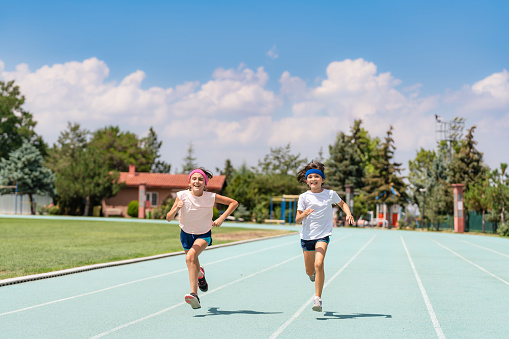 kids running a track race