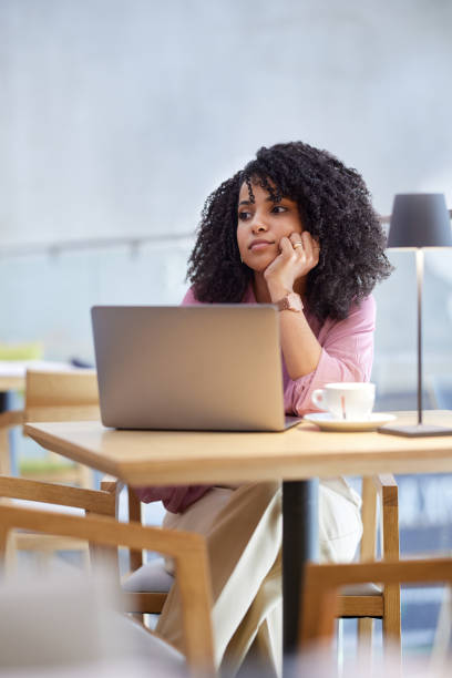 istock A freelancer sits in a cafe, and using the laptop. 1415269241