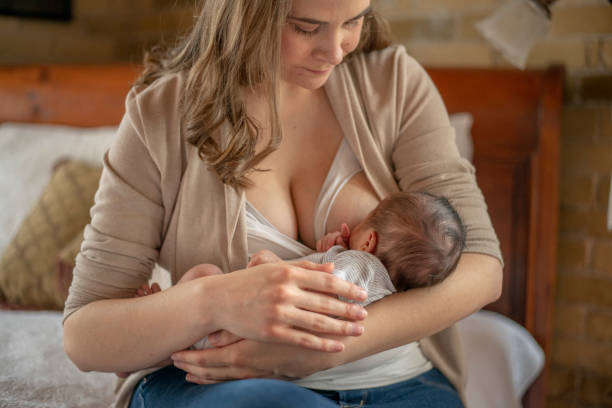 istock Mother Nursing her Infant 1415279633