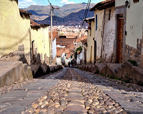 a view down a cobble street in Peru