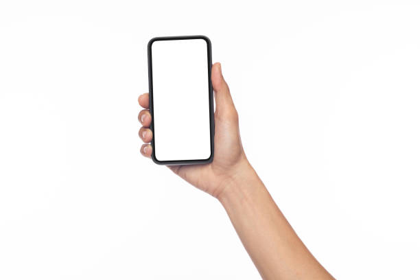 istock Hand man holding mobile smartphone with blank screen with space for inserting advertising text. isolated on white background with clipping path 1415287583
