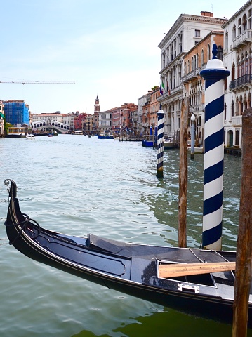 Venice neighborhood canal for gondolas. The gondolas plying the busy Grand Canal and the smaller waterways of Venice are one of the most iconic images in the world.