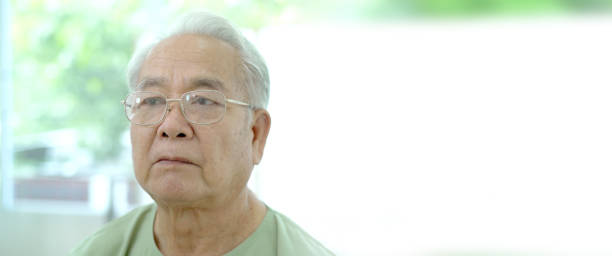 istock Asian elder man sitting on the bed. 1415297962
