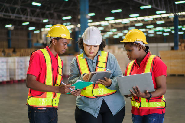 istock Group of foreman or engineer working in the warehouse. 1415297977