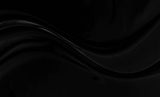 istock Black gray satin dark fabric texture luxurious shiny that is abstract silk cloth background with patterns soft waves blur beautiful. 1415298451