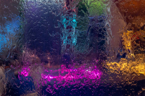 istock Water on glass with lights. Abstract background 1415299087