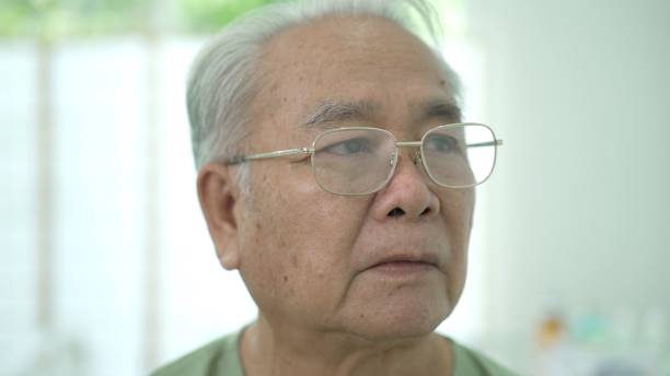 istock Asian elder man sitting on the bed. 1415299121