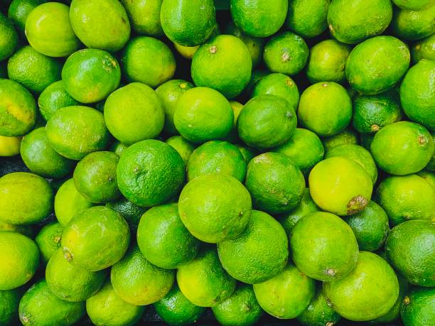 Green tangerines fruit background