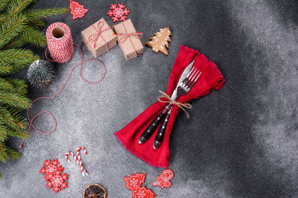 istock Gingerbread, Christmas tree decorations, dried citrus fruits on a gray concrete background 1415303064