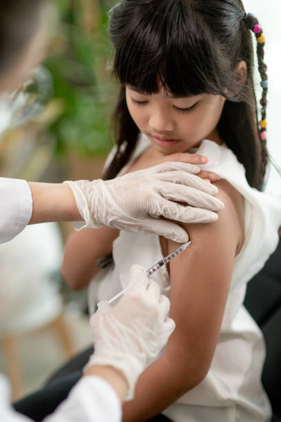 istock vaccination of children. An injection. Selective focus. 1415312126