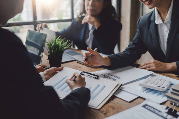 istock Business team meeting and presenting business results discussion and analysis data chart and graph, finance and accounting. Business performance concept. 1415312217