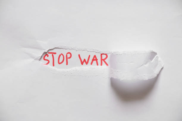 istock Written text stop war on white paper, protest action, no war between Russia and Ukraine. Stop war, protest action 1415314638