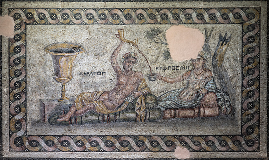 Mosaic of Dionysos, from the ruins of central panel from tesselated floor of a Roman villa (second half 2nd Century BCE). Depicted is Dionysos with fruit and ivy in his hair. Corinth, Greece.