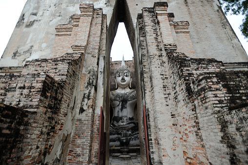 Sukhothai Historical Park is located in north-central Thailand. It covers the ruins of Sukhothai, literally 