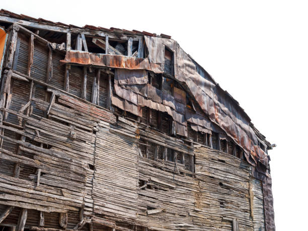 Weathered abandoned barn, located in the rural farming countryside.Taken in Los Banos, California, USA.