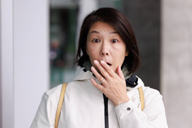 istock Scared woman on a street 1415321507