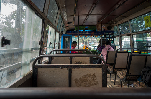 March 7th 2022. Dehradun Uttarakhand India. Inside of a moving public transport bus with passengers wearing masks.