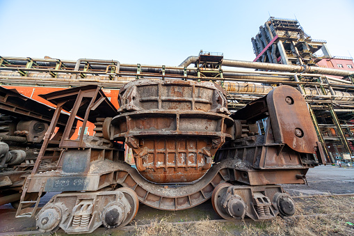 Abandoned railway with damaged wagons.Shougang in Beijing