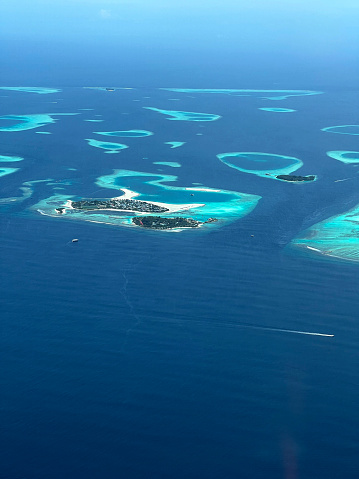 maldives from point of airplane view aerial vertical photo