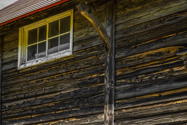 istock Old wall of old wooden construction 1415341857