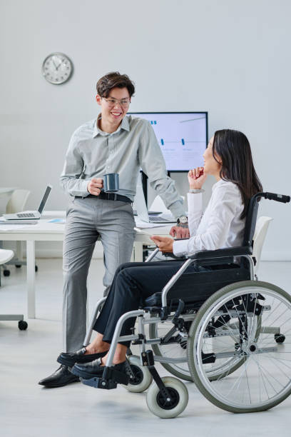 istock Colleagues talking to each other after meeting 1415342823