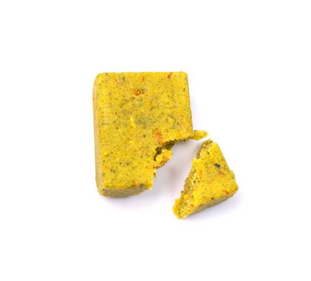 Stock Cube Isolated Stock cube isolated. Crumbled vegetable stock concentrat, , broken broth cubes, bouillon cube, instant spice soup ingredient on white background stock cubes stock pictures, royalty-free photos & images