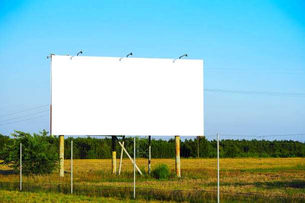 istock blank advertising billboard mockup. template for design. advertising billboard at sunset 1415342962