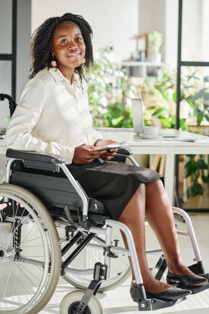 istock Businesswoman with disability working at office 1415343190