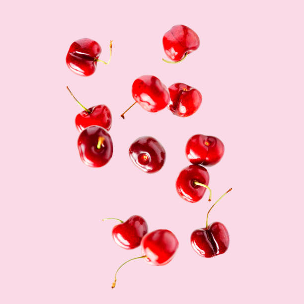 istock Set of falling ripe cherries. Banner design. Flying fruit as package design element. 1415343461