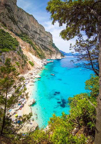 The famous touristic attraction in wild east coast of Sardinia island, Orosei gulf in the Baunei municipal, with wonderful beach and trekking path.