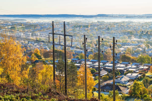 istock Power line at a city in autumn 1415347128