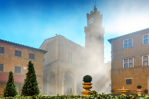 Foggy morning at the main square of Pienza, Tzscany, Italy