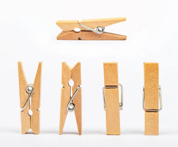 stack of clothespins on isolated white background.