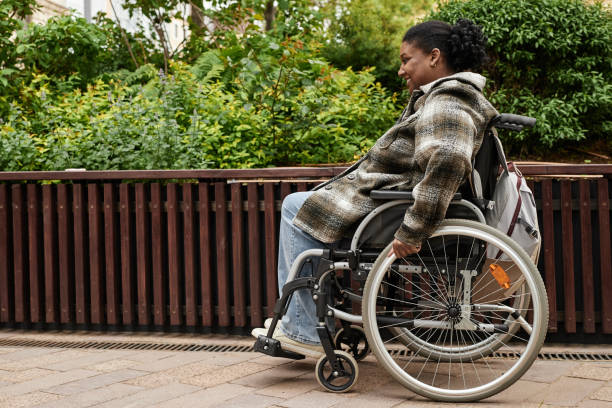 istock Woman with Disability in Garden 1415350069