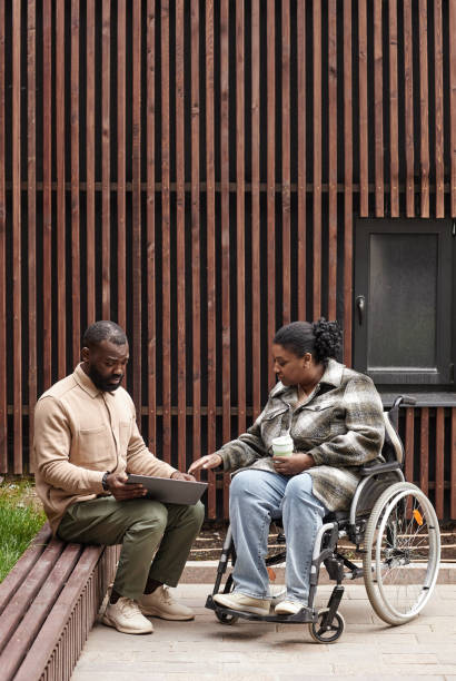 istock Black Woman with Disability in Outdoor Setting 1415350109